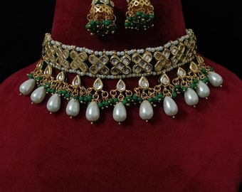 Sabyasachi designer kundan set, green Meena kundan bridal set, kundan bridal necklace set, customizable kundan bridal sets Royal kundan sets