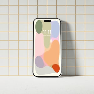 May include: A white smartphone with a black frame and a colourful abstract design on the screen. The time is displayed as 11:11.