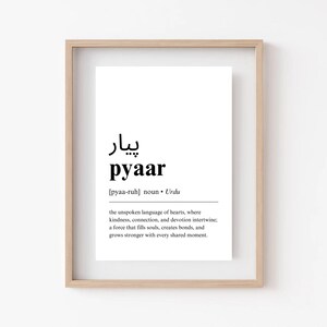 May include: A printable wall art print with a definition of the Urdu word "pyaar" which means love. The print is in black and white and features a simple, minimalist design.