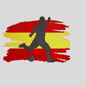 May include: A silhouette of a soccer player kicking a ball in front of a distressed Spanish flag. The flag is red and yellow with a stylized brushstroke effect.