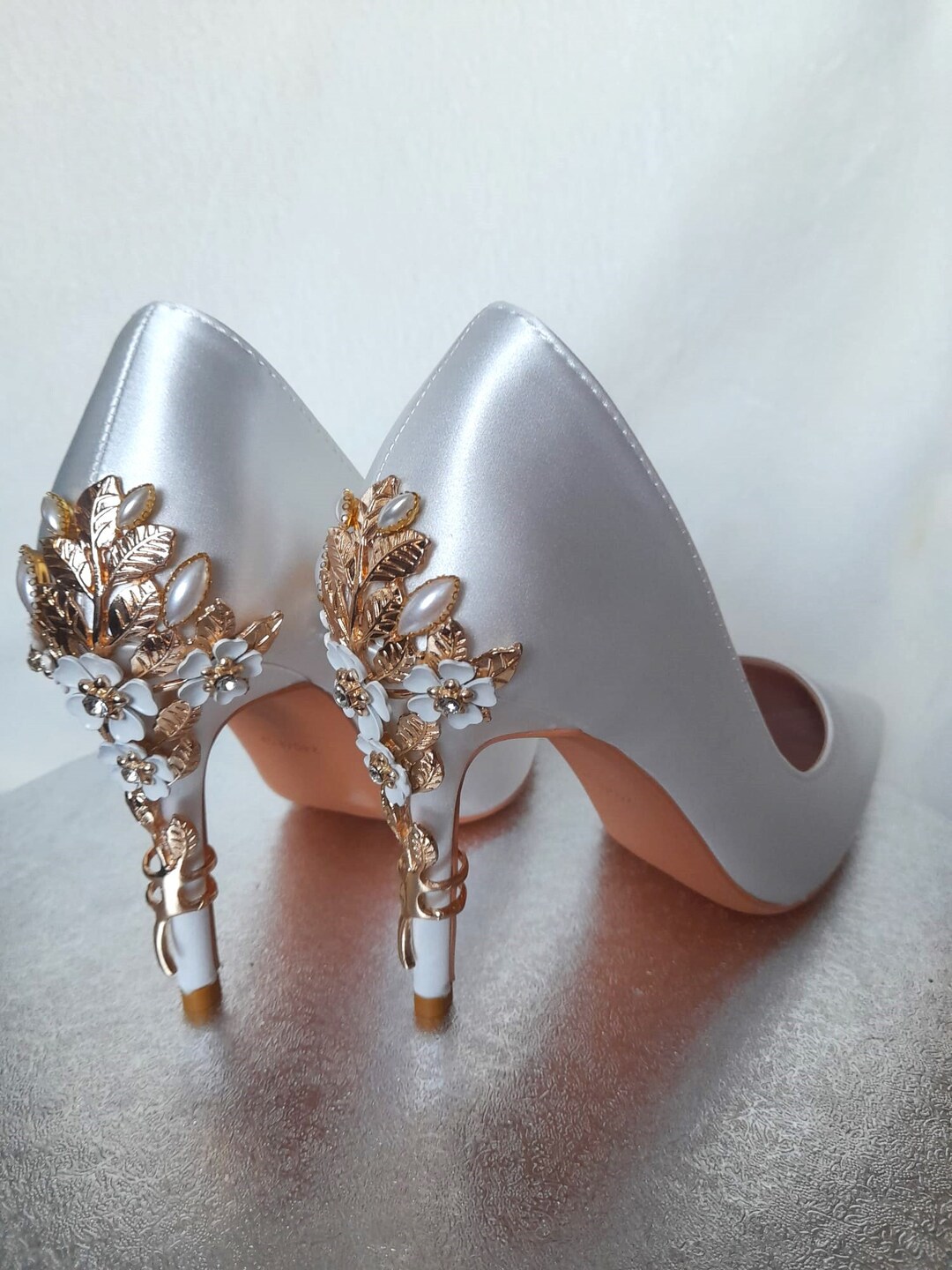 Chic White Satin Wedding Shoes Adorned With Floral Embellishment-ideal ...