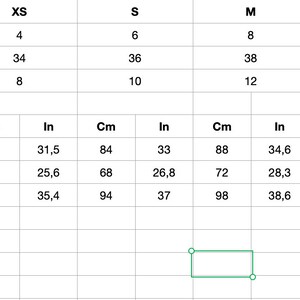 May include: Size chart for clothing with measurements in inches and centimeters. The chart shows sizes XS, S, M, and L with corresponding US, EU, and UK sizes. Measurements are provided for bust, waist, and hips.