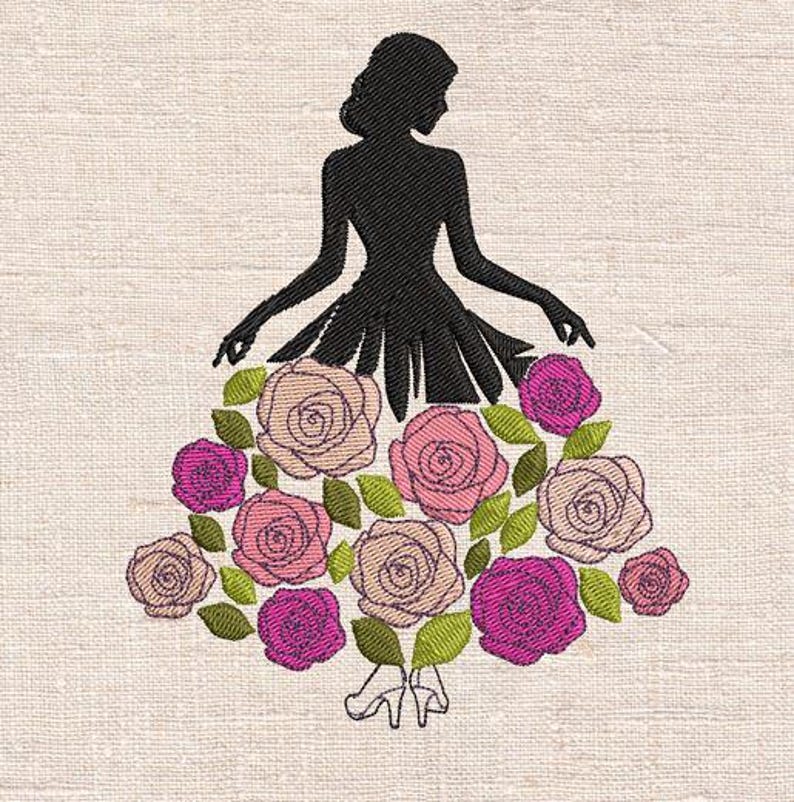 May include: A black silhouette of a person with a dress made of embroidered roses in shades of pink and beige, with green leaves. The person is wearing high heels. The background is a light beige fabric.