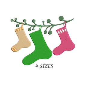 May include: Three Christmas stockings hanging from a green branch. The stockings are beige, green, and pink. The text "4 SIZES" is below the stockings.