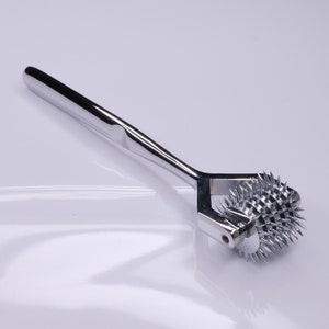 5-row spike wheel - Wartenberg wheel