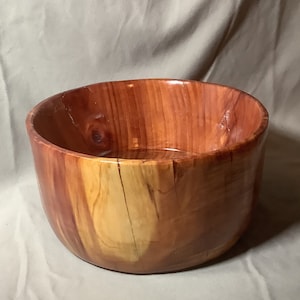 Cedar bowl for use as a serving dish, fruit bowl, or table decoration.