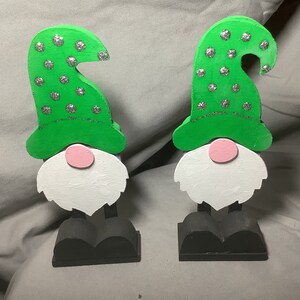 Christmas gnomes with green hats.