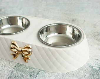 Cute stainless steel Dog & Cat food bowl with a golden bow.