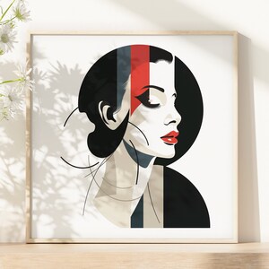 Puede incluir: Una ilustración digital de la cara de una mujer en un estilo geométrico en blanco y negro. La mujer tiene labios rojos y su cabello es negro. El fondo es blanco.
