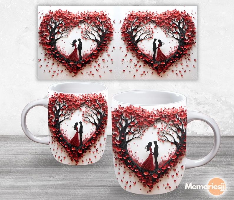 Puede incluir: Taza de cer&aacute;mica blanca con un dise&ntilde;o de coraz&oacute;n rojo y negro que presenta una pareja de pie en un &aacute;rbol. El coraz&oacute;n est&aacute; hecho de corazones de papel y la pareja est&aacute; en silueta.