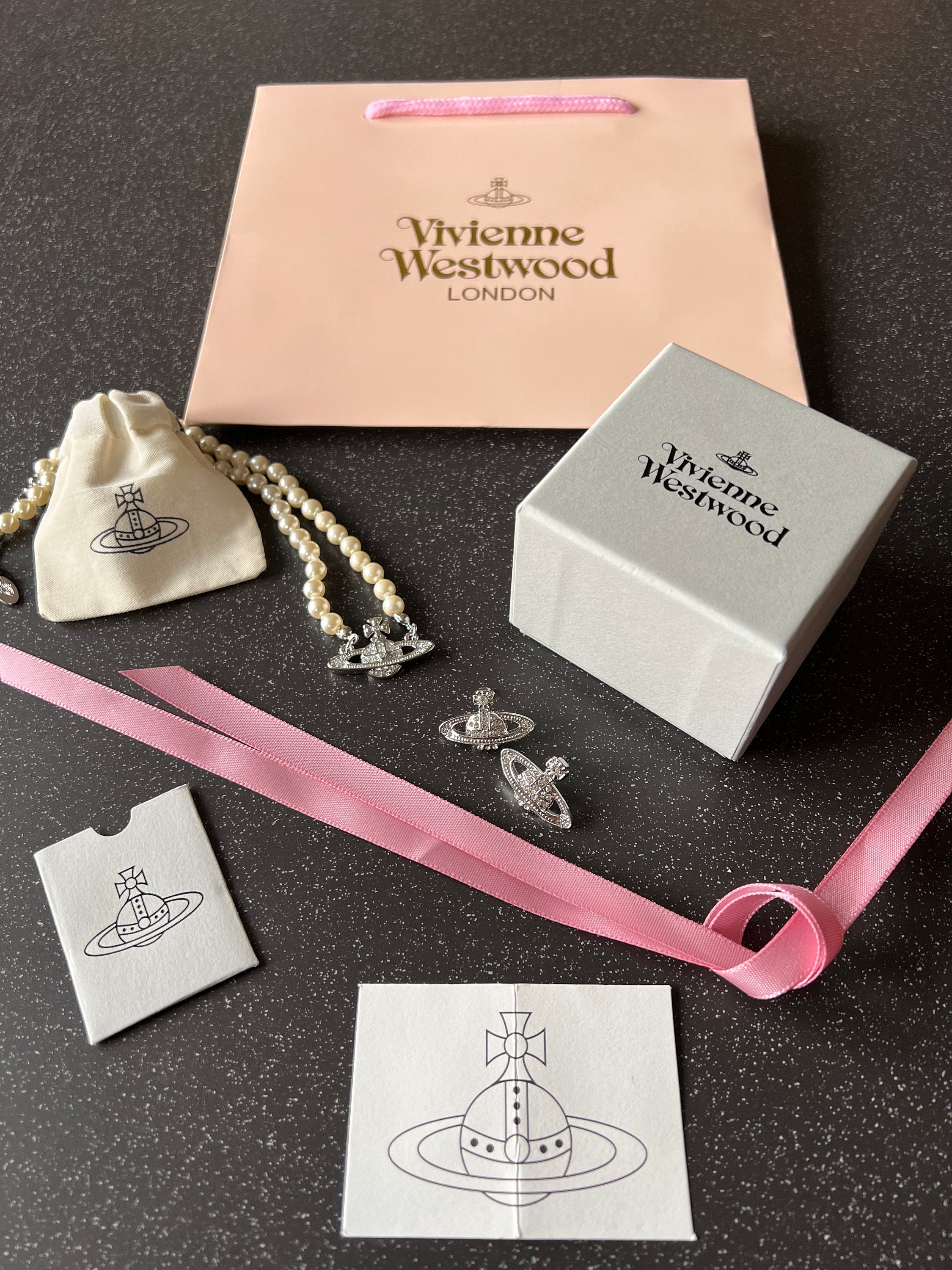 Wholesale Vivienne Westwood Pink Saturn Pearl Necklace with special packing  box and paper bag | Supply Leader — Wholesale Supply