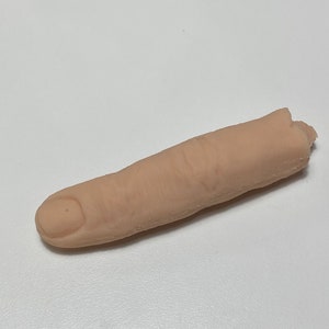 Realistic silicone finger, prosthetic finger prop