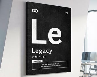 May include: Black and white canvas wall art featuring the word "Legacy" in large white letters, styled like a periodic table element. Includes the definition: "The goal is not to live forever. It is to create something that will."