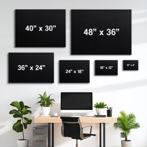 May include: A collection of six black rectangular canvases of varying sizes, with white text indicating dimensions. Sizes include 40" x 30", 48" x 36", 36" x 24", 24" x 18", 18" x 12", and 12" x 8". The canvases are displayed on a white wall.