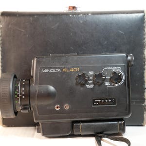 Cámara de película Minolta XL401 Super 8 probada (ver video) con estuche.