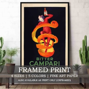 May include: A framed print of a vintage advertisement for Campari, featuring a person in a red suit standing on an orange peel. The text "Bitter Campari" is printed in green letters at the bottom of the print.
