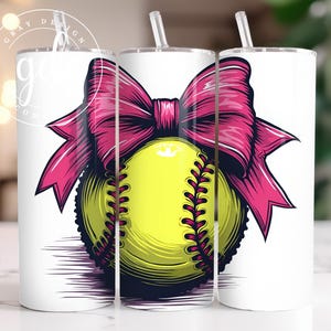 Könnte beinhalten: Ein weißer Becher mit einer rosa Schleife und einem gelben Softball mit schwarzen Nähten. Der Softball befindet sich in der Mitte des Bechers und die Schleife darüber.