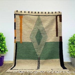 Verdant Treasures: Moroccan Green & White Hand-Woven Wool Rug Infused with Tribal Artistry and Berber Elegance