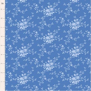 May include: Blue fabric with a repeating pattern of light blue roses and vines. The floral design is evenly spaced across the surface, creating a classic, vintage aesthetic. The fabric is measured in inches.