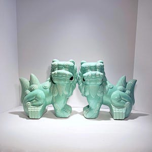 A Beautiful Pair of Celadon Ceramic Foo Dogs