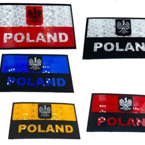 May include: Five different versions of a Polish flag patch. Each patch features a white eagle on a red background with the word "POLAND" printed below. The patches are made of reflective material and come in different colours, including white, red, blue, and yellow.