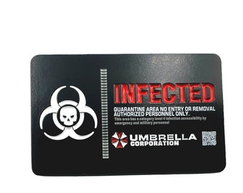 May include: Black rectangular sign with a red biohazard symbol and the text "INFECTED" in red. The sign also includes the text "QUARANTINE AREA NO ENTRY OR REMOVAL AUTHORIZED PERSONNEL ONLY." and "UMBRELLA CORPORATION" in red.