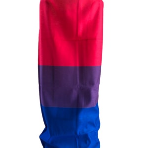 May include: A neck gaiter with three horizontal stripes in pink, purple, and blue.