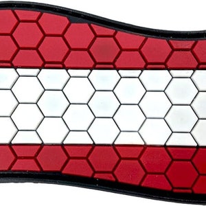 May include: A red, white and black flag patch with a honeycomb pattern. The flag has three horizontal stripes, with the top and bottom stripes being red and the middle stripe being white.
