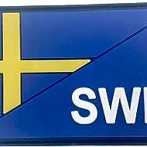 May include: A blue and yellow flag patch with the letters "SWE" in white.