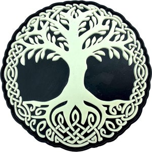 May include: A white tree of life with intricate roots and branches, surrounded by a black Celtic knot design. The design is on a black background.