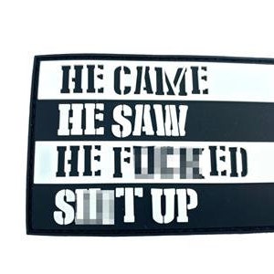 May include: A rectangular patch with the text "HE CAME HE SAW HE FUCKED SHIT UP" in bold white letters. The text is arranged in four lines, with alternating black and white horizontal stripes. The patch has a black border.