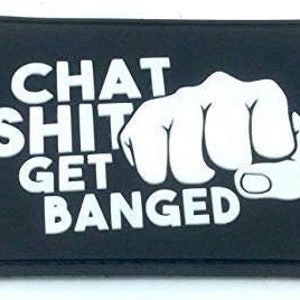 May include: Black patch with white text that reads "Chat Shit Get Banged" and a white fist with the index finger pointing forward.
