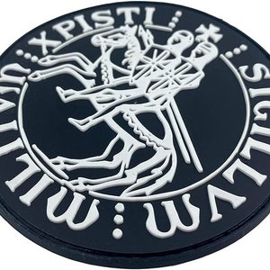 May include: Black and white patch with a circular design. The center features a stylized image of a knight riding a horse. The text around the image reads "SIGILLVM: WLLVM: XPISTI".