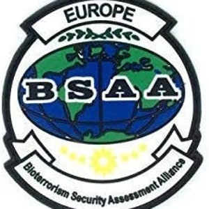 May include: A white circular patch with a black border. The patch features a blue and green globe with the text "BSAA" in black letters. The text "Bioterrorism Security Assessment Alliance" is written in black letters around the bottom of the globe. The text "EUROPE" is written in black letters at the top of the patch.