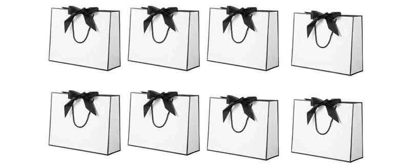 May include: A set of three ceramic mugs with a speckled, matte finish. The mugs are in shades of cream, light gray, and dark gray. Each mug has a simple, minimalist design, perfect for coffee or tea.