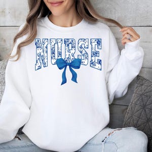 Toile De Jouy Nurse Bow Sweatshirt, Coquette Nurse Shirt, Gift For Nurse, Nurse Ribbon Hoodie, Registered Nurse Shirt, Floral Nurse Hoodie