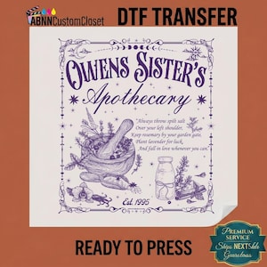 May include: A white DTF transfer sheet featuring purple line art with the text Owens Sister's Apothecary, Est. 1995, and a quote about salt, rosemary, and lavender. The design includes a mortar and pestle, a glass bottle, and botanical elements.