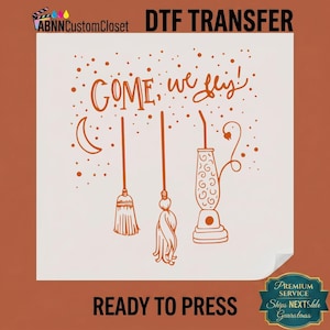 May include: A white DTF transfer sheet featuring an orange graphic design with the text "GOME, we fly!" accompanied by illustrations of a crescent moon, two broomsticks, and a vacuum cleaner, surrounded by small scattered orange dots.