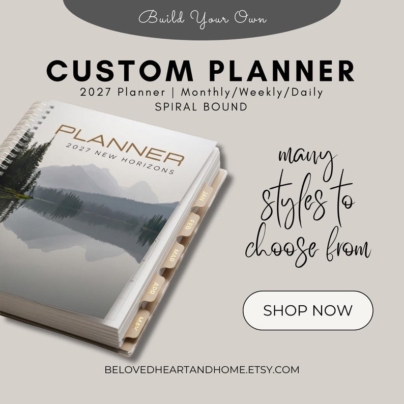 May include: A spiral-bound 2027 custom planner with a landscape cover featuring a lake and mountain scene. The cover text reads PLANNER 2027 NEW HORIZONS. The planner includes monthly tab dividers labeled JAN, FEB, MAR, APR, and MAY along the side.