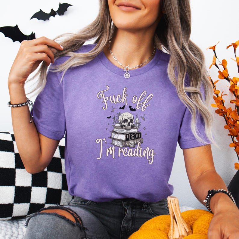 Fuck Off I'm Reading Unisex T-Shirt Skull and Books Graphic Sarcastic Halloween Tee Book Lovers Halloween Shirt for Introverts T-shirt Heather Team Purple