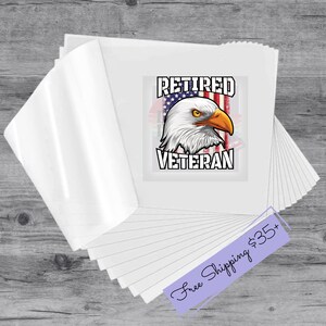 Peut inclure: Une pile d'autocollants en vinyle blanc avec un design de drapeau américain et d'aigle chauve. L'autocollant indique "Vétéran retraité".