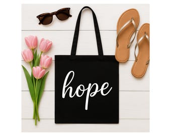 Schwarze Einkaufstasche mit inspirierenden Zitaten