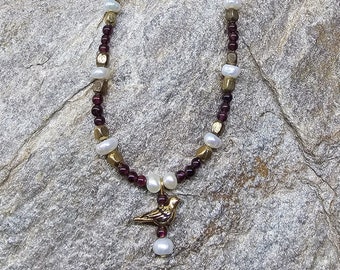 Bird charm beaded necklace! Freshwater pearls, garnets, tiny vintage brass spacers, heart floral toggle clasp, dainty, Hellenistic, Greek