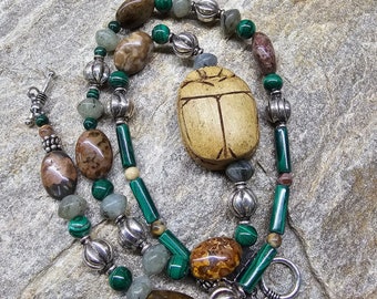 Egyptian Revival Southwest beaded necklace! Antique scarab focal bead paired with malachite, jasper, sterling silver and labradorite.