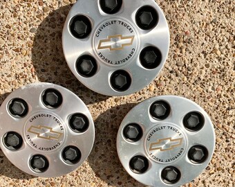 1999-2001 Chevrolet OEM No 15712387 6 Lug Wheel Hub Covers for Silverado 1500 Automobiles, Lot of 3.  Bin YR8