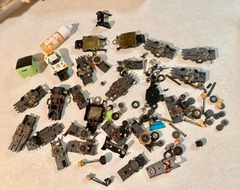 Piezas de coches de slot Aurora AFX escala HO vintage y chasis de coches de serie, coleccionables. Caja WR6