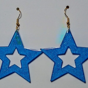 Pendientes de estrella con purpurina holográfica azul