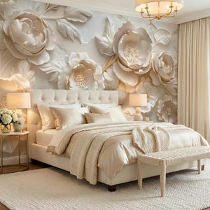 May include: A bedroom with a large bed, side tables, and a rug. The focal point is a wall mural of large, cream-colored floral designs. The bed is covered in cream-colored bedding, and the room has a soft, neutral color palette.