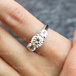 Round Cut CZ Three Stone Sterling Silver Engagement Ring