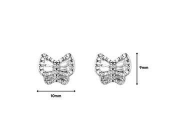 May include: A pair of silver-toned butterfly-shaped stud earrings featuring baguette and round-cut clear stones. The earrings measure 10mm in width and 9mm in height as indicated by the black dimension arrows and text labels on the image.
